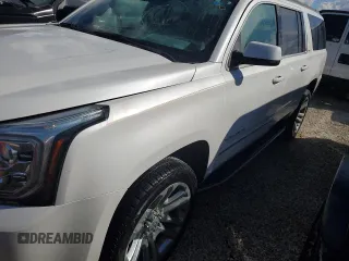 2020 GMC Yukon XL SLT with VIN 1GKS1GKC0LR160258, listed as a Copart auction lot 76796114 with 0 mi miles and Salvage Title. Bid and sale history available at carsss.com. Image 1.