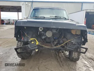 1988 Ford Bronco XL with VIN 1FMEU15N3JLA20890, listed as a Copart auction lot 79555004 with 0 mi miles and Salvage Title. Bid and sale history available at carsss.com. Image 5.