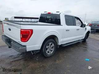 2021 Ford F-150 XL with VIN 1FTEW1CP6MFB24439, listed as a IAAI auction lot 41705331 with 76,463 mi miles. Bid and sale history available at carsss.com. Image 4.