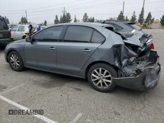 2012 Volkswagen Jetta SE with VIN 3VWDP7AJ5CM427654, listed as a Copart auction lot 60305055 with 138,222 mi miles and Salvage title. Bid and sale history available at DreamBid. Image 2.