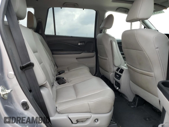 2017 Honda Pilot Touring z VIN 5FNYF6H92HB006855, wystawiony jako Copart lot #53650655 z przebiegiem 130 732 mil mil oraz Szkoda całkowita • Salvage title. Historia ofert i sprzedaży dostępna na DreamBid. Obrazek 11.