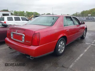 2002 Cadillac DeVille with VIN 1G6KD57YX2U257123, listed as a IAAI auction lot 41952025 with 180,278 mi miles. Bid and sale history available at carsss.com. Image 4.