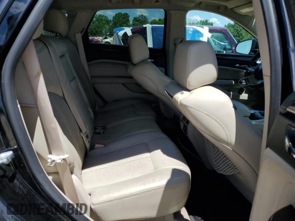 2012 Cadillac SRX Premium Collection with VIN 3GYFNFE32CS549742, listed as a Copart auction lot 63304675 with 114,627 mi miles and Salvage title. Bid and sale history available at DreamBid. Image 11.