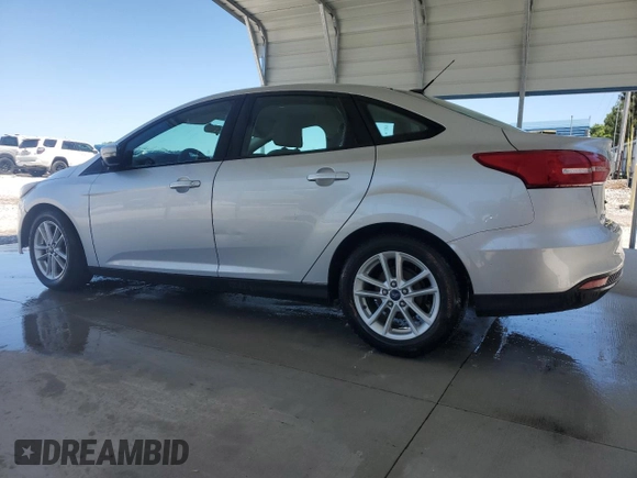 2016 Ford Focus SE with VIN 1FADP3F27GL336945, listed as a Copart auction lot 57811575 with 134,015 mi miles and Salvage title. Bid and sale history available at DreamBid. Image 2.