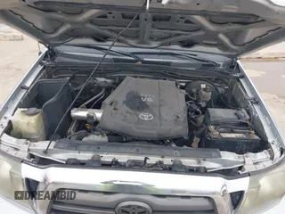 2009 Toyota Tacoma PreRunner with VIN 3TMJU62NX9M081748, listed as a IAAI auction lot 41608525 with 210,999 mi miles. Bid and sale history available at carsss.com. Image 10.