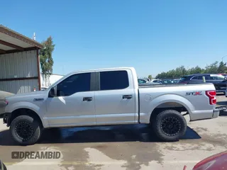 2018 Ford F-150 XL with VIN 1FTEW1CP6JKF36573, listed as a IAAI auction lot 42314415 with 121,240 mi miles and . Bid and sale history available at DreamBid. Image 15.
