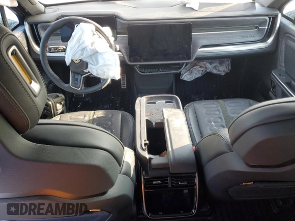2024 Rivian R1S Adventure z VIN 7PDSGABA1RN043089, wystawiony jako Copart lot #43860515 z przebiegiem Nie podano mil oraz Nie do naprawy. Historia ofert i sprzedaży dostępna na DreamBid. Obrazek 8.