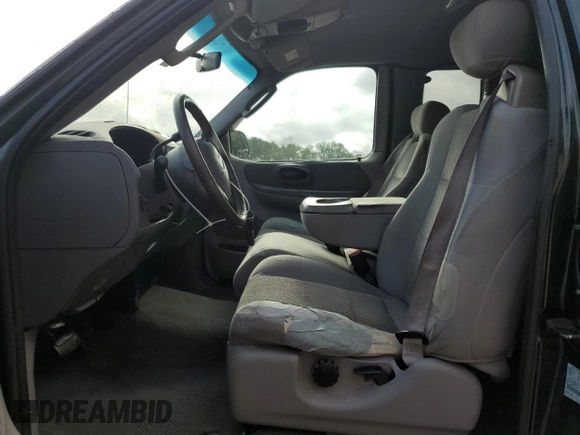 2003 Ford F-150 XL with VIN 1FTRX07WX3KB99581, listed as a Copart auction lot 56907765 with 232,597 mi miles and Salvage title. Bid and sale history available at DreamBid. Image 7.