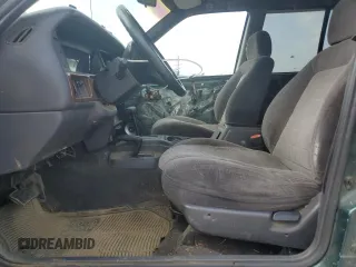 1997 Jeep Grand Cherokee Laredo with VIN 1J4GZ58SXVC595012, listed as a Copart auction lot 59746655 with Not provided miles and Salvage title. Bid and sale history available at DreamBid. Image 7.