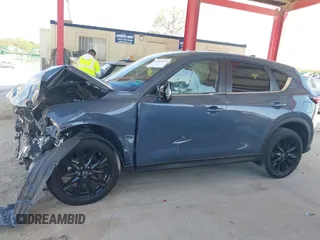2021 Mazda CX-5 Touring with VIN JM3KFBCM3M0406787, listed as a IAAI auction lot 41800564 with 42,254 mi miles and . Bid and sale history available at carsss.com. Image 15.