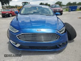 2018 Ford Fusion Titanium with VIN 3FA6P0D97JR219690, listed as a Copart auction lot 63773595 with 138,066 mi miles and Salvage title. Bid and sale history available at DreamBid. Image 5.