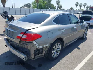 2012 Infiniti M with VIN JN1BY1AR3CM391052, listed as a IAAI auction lot 42178760 with 198,116 mi miles and . Bid and sale history available at DreamBid. Image 4.