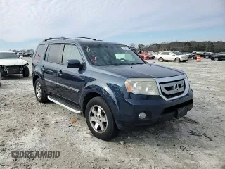 2011 Honda Pilot Touring with VIN 5FNYF4H96BB077391, listed as a Copart auction lot 41520315 with 196,291 mi miles and Salvage Title. Bid and sale history available at DreamBid. Image 12.