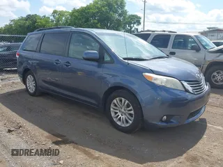 2014 Toyota Sienna XLE with VIN 5TDYK3DC2ES491761, listed as a IAAI auction lot 42634561 with 216,318 mi miles and . Bid and sale history available at DreamBid. Image 1.