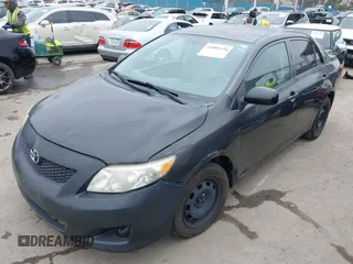 2009 Toyota Corolla with VIN 1NXBU40E49Z165082, listed as a IAAI auction lot 41881134 with 261,282 mi miles. Bid and sale history available at carsss.com. Image 2.