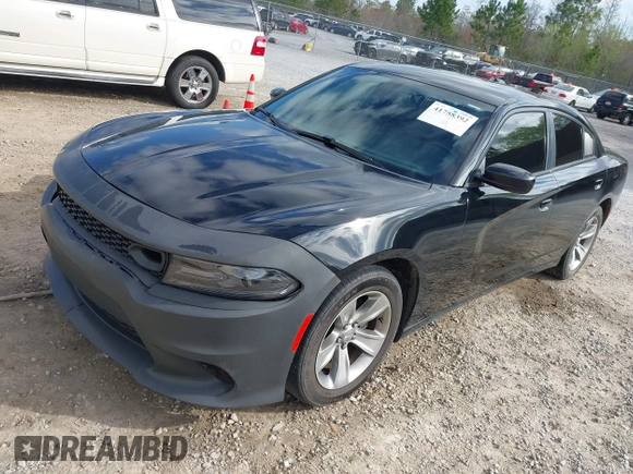 2018 Dodge Charger SXT Plus with VIN 2C3CDXHG1JH139311, listed as a IAAI auction lot 41758392 with 103,034 mi miles and . Bid and sale history available at carsss.com. Image 2.