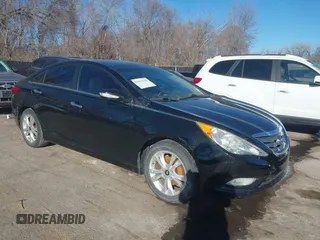 2012 Hyundai Sonata SE z VIN 5NPEC4AC0CH396046, wystawiony jako IAAI lot #41553318 z przebiegiem 148 910 mil mil oraz . Historia ofert i sprzedaży dostępna na DreamBid. Obrazek 1.