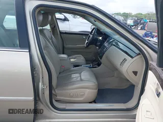 2009 Cadillac DTS 1SA z VIN 1G6KD57Y19U127449, wystawiony jako IAAI lot #42116152 z przebiegiem 107 901 mil mil oraz . Historia ofert i sprzedaży dostępna na DreamBid. Obrazek 5.