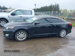 2015 Kia Optima EX with VIN 5XXGN4A71FG391444, listed as a IAAI auction lot 41991844 with 126,197 mi miles. Bid and sale history available at carsss.com. Image 14.