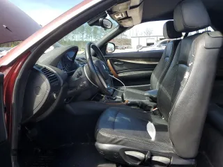 2013 BMW 1 Series 128i with VIN WBAUL7C51DVU08778, listed as a Copart auction lot 47246415 with 56,759 mi miles and Salvage Title. Bid and sale history available at carsss.com. Image 7.