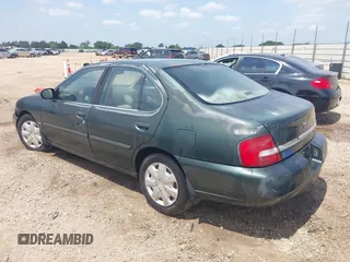2001 Nissan Altima GXE with VIN 1N4DL01D81C188606, listed as a IAAI auction lot 42088829 with 13 mi miles. Bid and sale history available at carsss.com. Image 3.