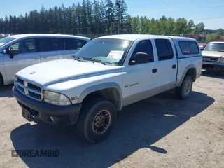 2000 Dodge Dakota Sport with VIN 1B7GG2AN9YS792231, listed as a IAAI auction lot 42174764 with 285,535 mi miles and . Bid and sale history available at carsss.com. Image 2.
