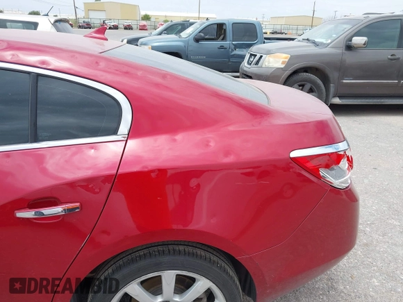 2013 Buick LaCrosse Touring z VIN 1G4GJ5G32DF285307, wystawiony jako IAAI lot #42566928 z przebiegiem 186 530 mil mil oraz . Historia ofert i sprzedaży dostępna na DreamBid. Obrazek 6.