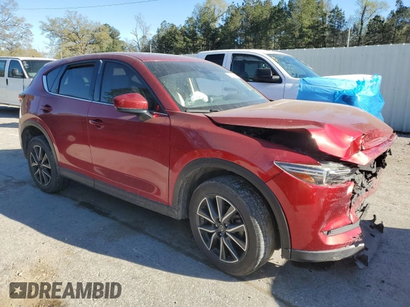2018 Mazda CX-5 Grand Touring with VIN JM3KFADM1J1454982, listed as a Copart auction lot 49162495 with 109,559 mi miles and Salvage Title. Bid and sale history available at DreamBid. Image 4.