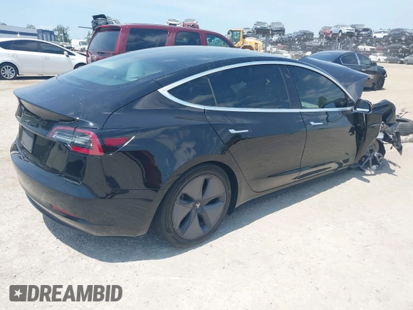2020 Tesla Model 3 Standard Range Plus z VIN 5YJ3E1EA9LF738102, wystawiony jako IAAI lot #42107744 z przebiegiem 73 294 mil mil oraz . Historia ofert i sprzedaży dostępna na DreamBid. Obrazek 4.