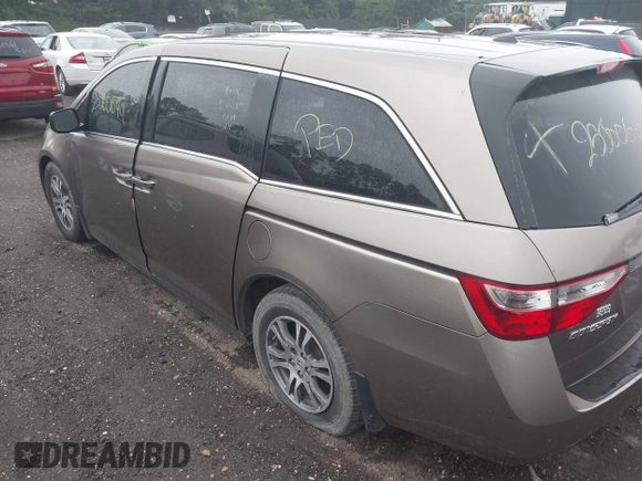 2011 Honda Odyssey EX-L with VIN 5FNRL5H68BB054204, listed as a IAAI auction lot 42576248 with Not provided miles and . Bid and sale history available at DreamBid. Image 3.