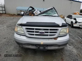 2003 Ford F-150 XL with VIN 1FTRF172X3NB77391, listed as a Copart auction lot 80657174 with Not Provided miles and Salvage Title. Bid and sale history available at DreamBid. Image 5.