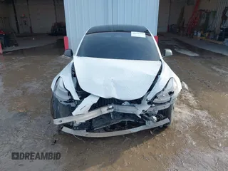2021 Tesla Model 3 Long Range with VIN 5YJ3E1EB6MF094309, listed as a IAAI auction lot 41651475 with Not Provided miles. Bid and sale history available at carsss.com. Image 11.