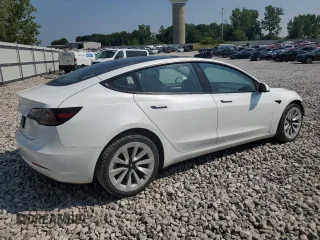 2023 Tesla Model 3 with VIN 5YJ3E1EA8PF449797, listed as a Copart auction lot 64601115 with 99,771 mi miles and Clean title. Bid and sale history available at DreamBid. Image 3.