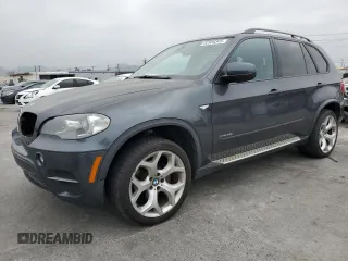 2012 BMW X5 35i with VIN 5UXZV4C59CL765586, listed as a Copart auction lot 52939345 with 114,971 mi miles and Salvage title. Bid and sale history available at DreamBid. Image 1.