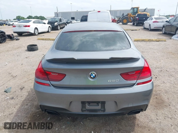 2014 BMW 6 Series 650i z VIN WBA6B2C55ED128934, wystawiony jako IAAI lot #42070641 z przebiegiem 102 597 mil mil oraz . Historia ofert i sprzedaży dostępna na DreamBid. Obrazek 16.