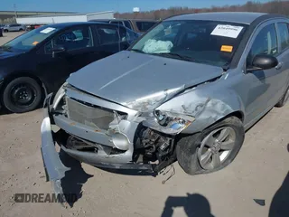 2011 Dodge Caliber Mainstreet with VIN 1B3CB3HA9BD295750, listed as a IAAI auction lot 42049996 with Not Provided miles. Bid and sale history available at carsss.com. Image 6.