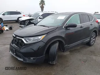 2018 Honda CR-V EX with VIN 2HKRW1H5XJH512641, listed as a IAAI auction lot 41920032 with 70,995 mi miles. Bid and sale history available at carsss.com. Image 2.