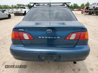 1998 Toyota Corolla VE with VIN 2T1BR18E6WC072503, listed as a Copart auction lot 58751795 with 306,052 mi miles and Salvage title. Bid and sale history available at DreamBid. Image 6.