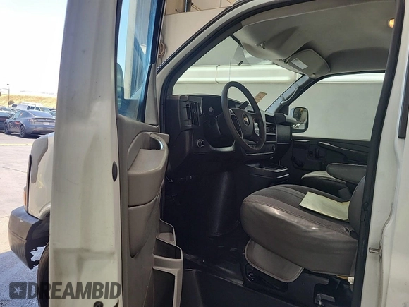2010 Chevrolet Express Cargo with VIN 1GCZGFBA1A1159021, listed as a IAAI auction lot 42773963 with 181,378 mi miles and . Bid and sale history available at DreamBid. Image 14.