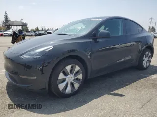 2024 Tesla Model Y Long Range with VIN 7SAYGDEE4RA228916, listed as a Copart auction lot 54921575 with 13,607 mi miles and Salvage title. Bid and sale history available at DreamBid. Image 1.