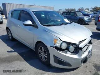 2013 Chevrolet Sonic LT with VIN 1G1JC6SG0D4202398, listed as a IAAI auction lot 42067950 with 141,114 mi miles. Bid and sale history available at carsss.com. Image 1.
