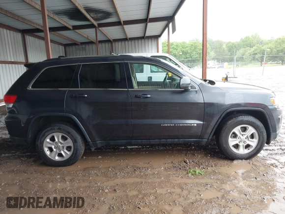 2014 Jeep Grand Cherokee Laredo with VIN 1C4RJEAG6EC206748, listed as a IAAI auction lot 42244421 with 198,217 mi miles and . Bid and sale history available at DreamBid. Image 13.
