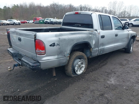 2003 Dodge Dakota Sport with VIN 1D7HG38X13S267227, listed as a IAAI auction lot 41952281 with 119,641 mi miles and . Bid and sale history available at carsss.com. Image 4.