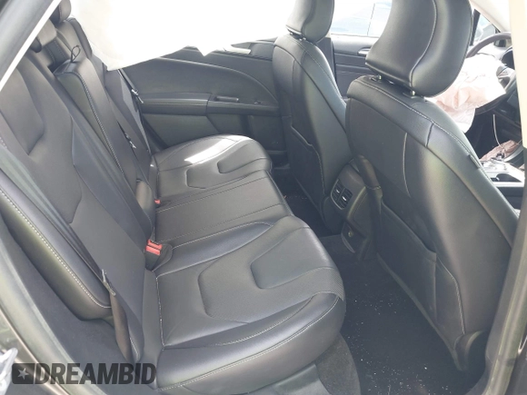 2018 Ford Fusion Titanium with VIN 3FA6P0D9XJR169657, listed as a IAAI auction lot 42392112 with 62,754 mi miles and . Bid and sale history available at DreamBid. Image 8.