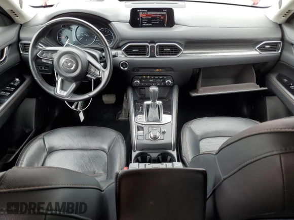 2019 Mazda CX-5 Grand Touring with VIN JM3KFBDM2K0639247, listed as a Copart auction lot 64060045 with 69,563 mi miles and Salvage title. Bid and sale history available at DreamBid. Image 8.