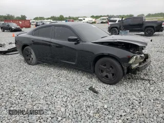 2012 Dodge Charger Police with VIN 2C3CDXATXCH230930, listed as a Copart auction lot 51456915 with 101,325 mi miles and Salvage Title. Bid and sale history available at carsss.com. Image 4.