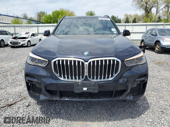 2023 BMW X5 xDrive45e z VIN 5UXTA6C01P9R61137, wystawiony jako Copart lot #56458155 z przebiegiem 27 501 mil mil oraz Szkoda całkowita • Salvage title. Historia ofert i sprzedaży dostępna na DreamBid. Obrazek 5.
