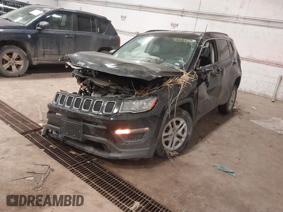 2021 Jeep Compass Sport with VIN 3C4NJDAB2MT584484, listed as a IAAI auction lot 41337382 with 96,940 mi miles and . Bid and sale history available at DreamBid. Image 18.