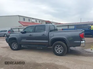 2018 Toyota Tacoma SR5 with VIN 5TFAZ5CN5JX062498, listed as a IAAI auction lot 41867393 with 128,879 mi miles and . Bid and sale history available at DreamBid. Image 15.