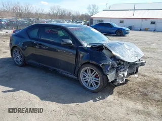 2013 Scion tC z VIN JTKJF5C74D3050440, wystawiony jako IAAI lot #41899770 z przebiegiem 106 736 mil mil oraz . Historia ofert i sprzedaży dostępna na DreamBid. Obrazek 1.